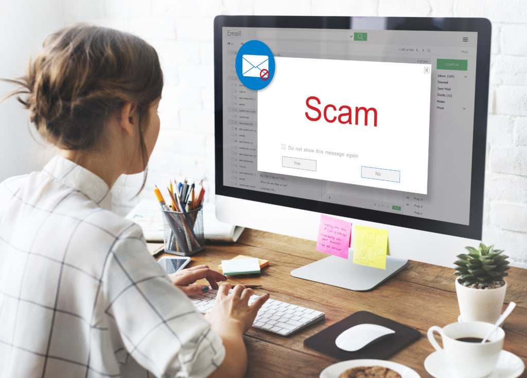 Small business administrator receiving email scam