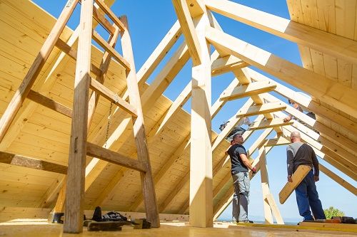 Workers building a home for local mortgage lenders