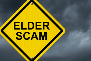 Elderly fraud scams sign