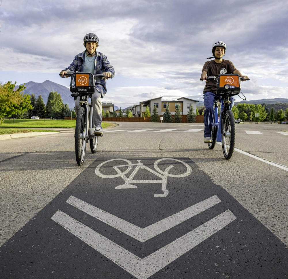 Picture of 2 cyclists enjoying We Cycle ride sharing